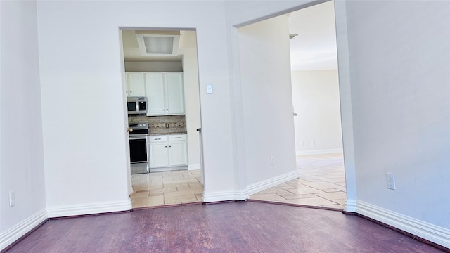 interior space with light tile patterned floors