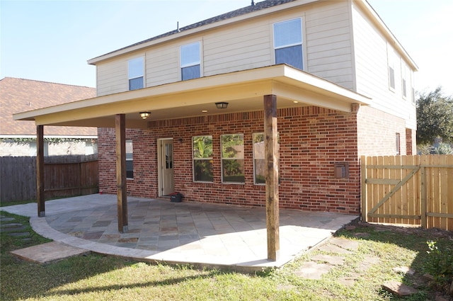 rear view of property with a patio