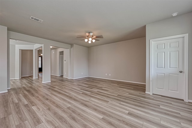 unfurnished living room featuring light hardwood / wood-style flooring and ceiling fan