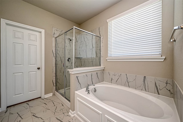 bathroom with shower with separate bathtub