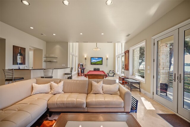 living room with french doors and pool table