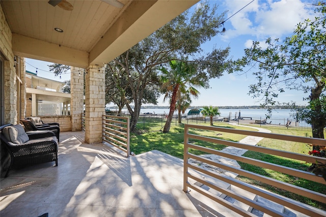 view of patio / terrace with a water view