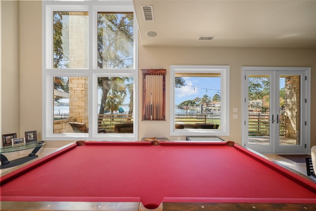 playroom featuring french doors and pool table