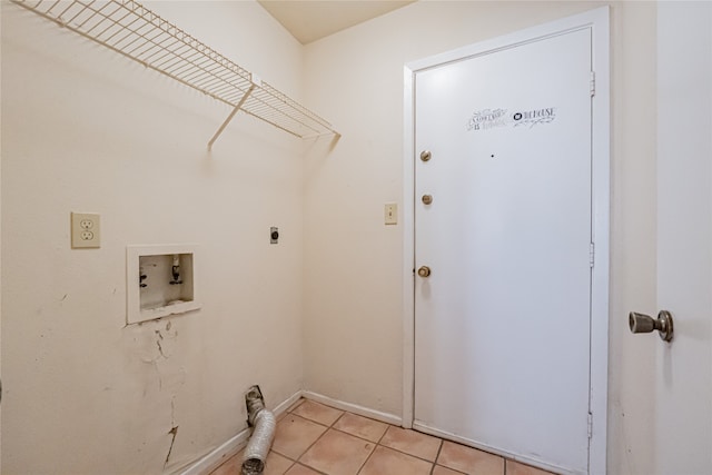 washroom with electric dryer hookup, light tile patterned flooring, and hookup for a washing machine