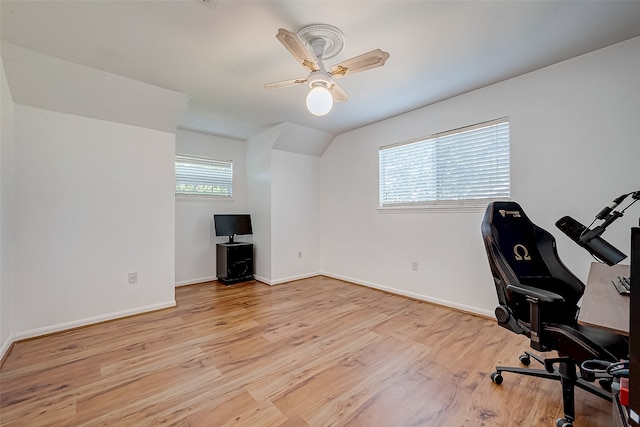 unfurnished office featuring ceiling fan and light hardwood / wood-style flooring