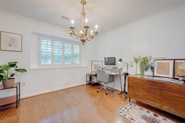 office area with light hardwood / wood-style floors, crown molding, and a notable chandelier