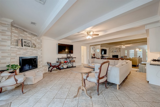 tiled living room with beam ceiling, ceiling fan, a fireplace, and ornamental molding