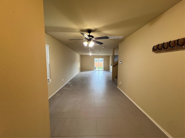 corridor featuring tile patterned flooring