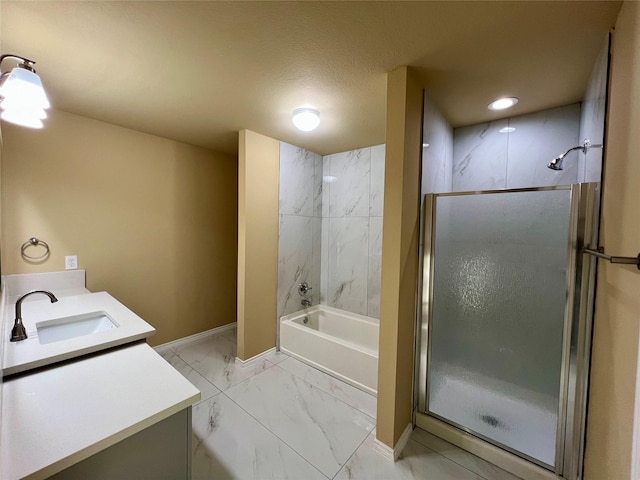 bathroom with vanity, independent shower and bath, and a textured ceiling