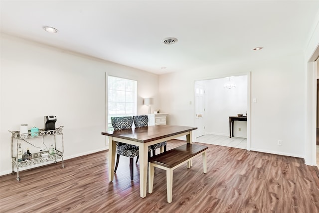 dining area with light wood-type flooring