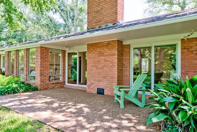 rear view of property with a patio