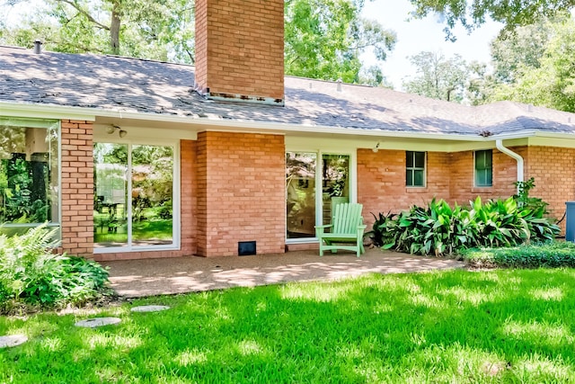 rear view of property with a patio area