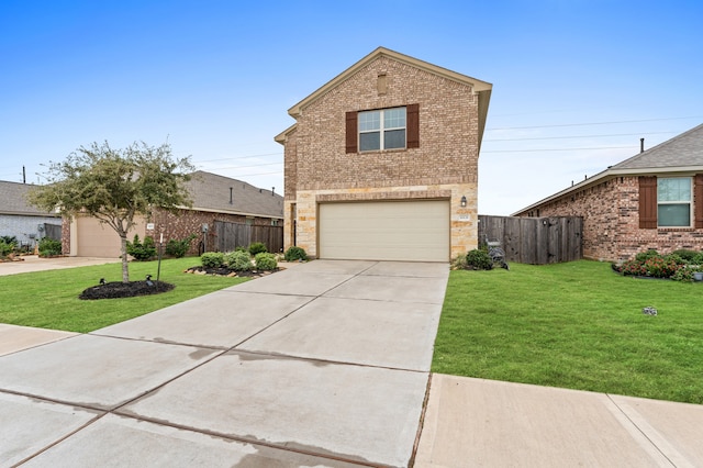 front of property featuring a garage and a front lawn