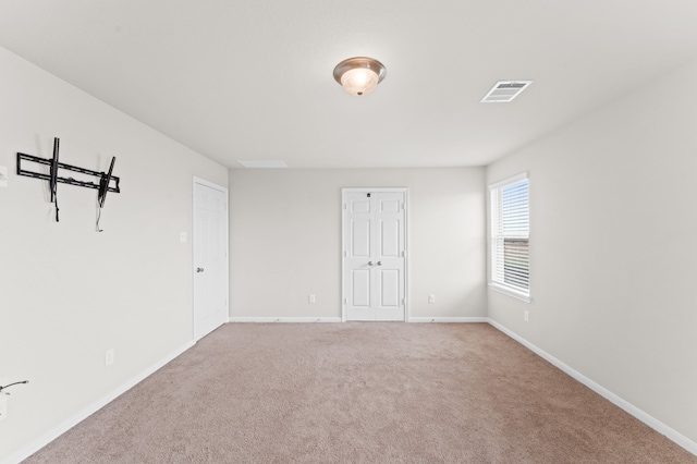 spare room with carpet flooring