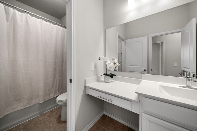 full bathroom with toilet, vanity, tile patterned floors, and shower / bath combo with shower curtain