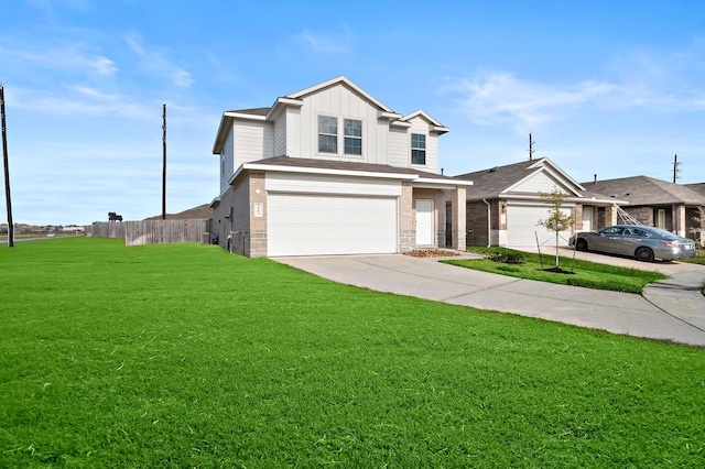 view of front of property with a front lawn and a garage