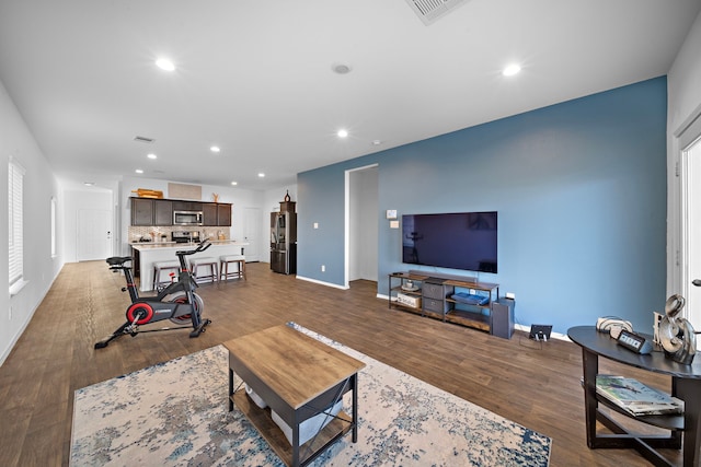 living room with wood-type flooring