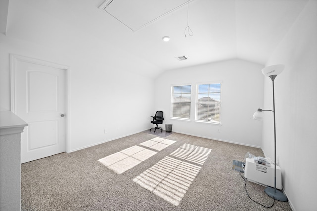 additional living space with light carpet and vaulted ceiling