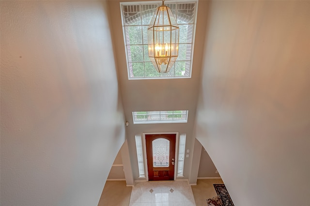 foyer with a notable chandelier