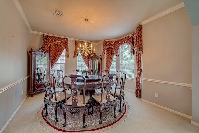 carpeted dining space featuring a notable chandelier and ornamental molding