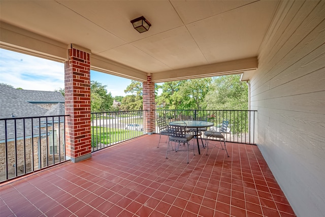 view of patio / terrace with a balcony