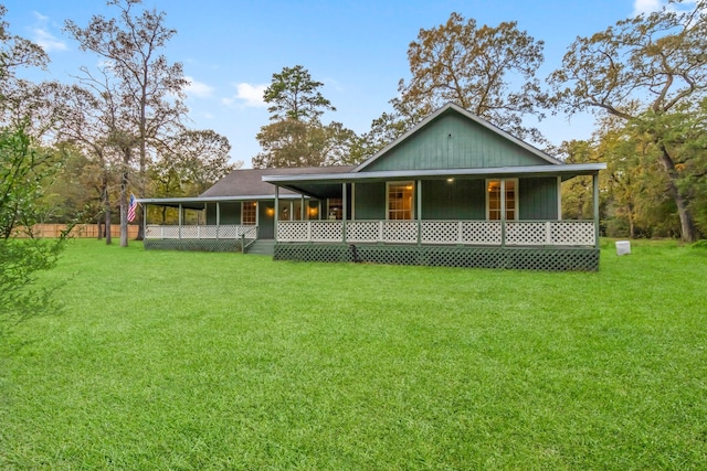 view of front of house featuring a front lawn and a porch