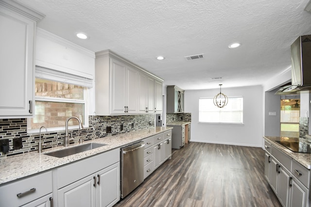 kitchen with sink, stainless steel dishwasher, dark hardwood / wood-style floors, decorative backsplash, and black electric cooktop