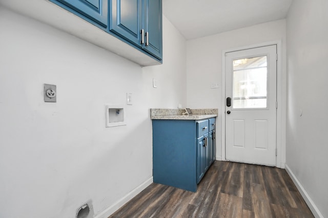 laundry area featuring hookup for a washing machine, cabinets, dark hardwood / wood-style floors, and hookup for an electric dryer