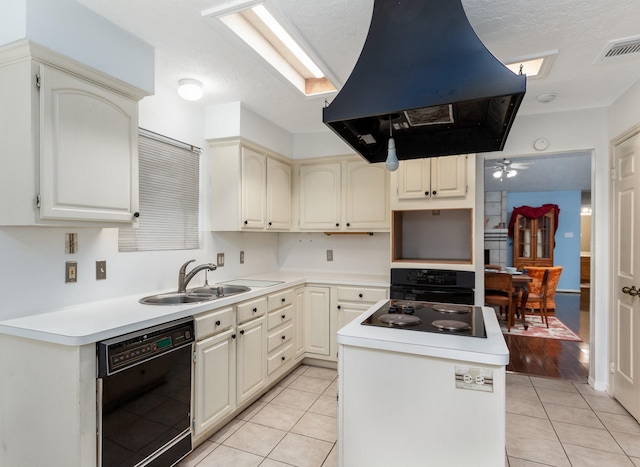 16418 Red Oak Dr, Missouri City, TX 77489 - kitchen featuring sink, light tile patterned flooring, black appliances, and island exhaust hood