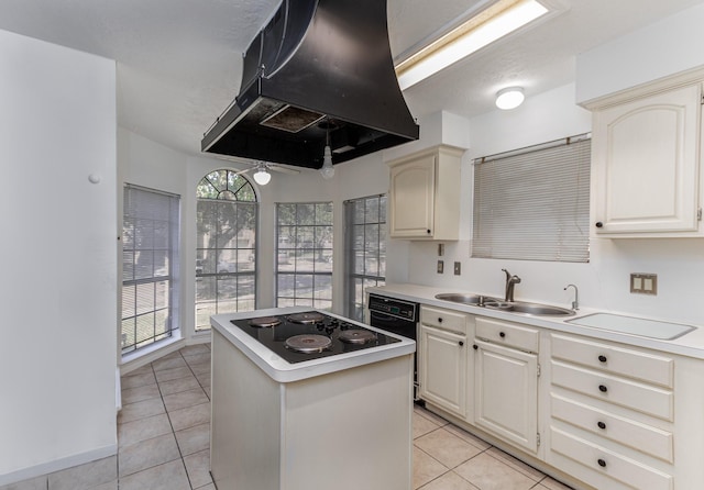 16418 Red Oak Dr, Missouri City, TX 77489 - kitchen with black appliances, a kitchen island, sink, island range hood, and light tile patterned floors