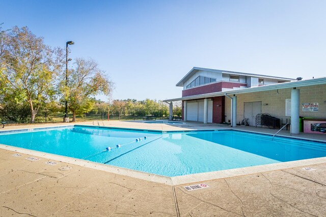 16418 Red Oak Dr, Missouri City, TX 77489 - view of pool featuring a patio