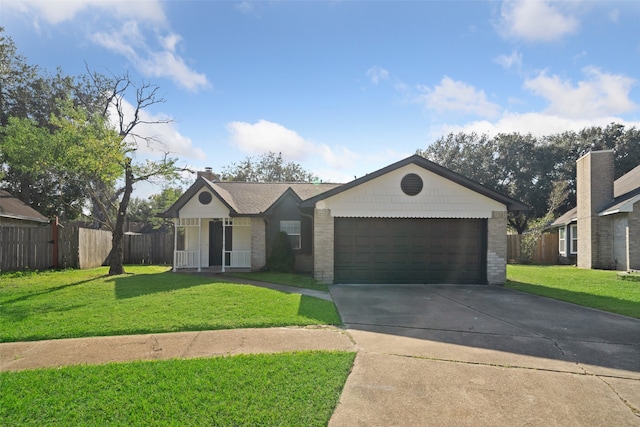 ranch-style home featuring a front yard and a garage