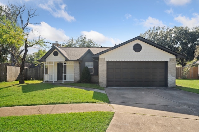 single story home with a garage and a front lawn