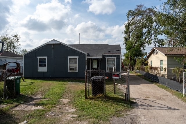 bungalow with a front yard