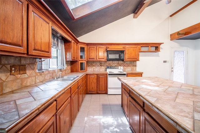 kitchen featuring tile countertops, white range with electric stovetop, and lofted ceiling with beams