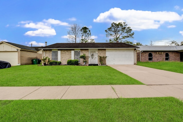 ranch-style home with a front yard and a garage