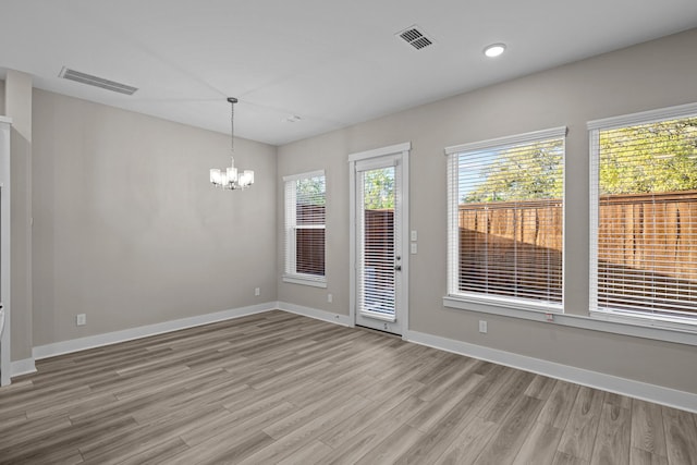 16034 Mason Run Dr, Houston, TX 77079 - unfurnished dining area featuring light wood-type flooring, a chandelier, and recessed lighting