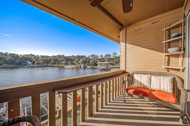 balcony featuring a water view