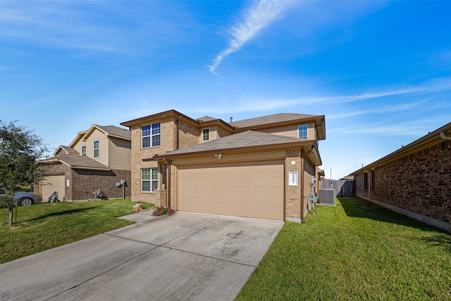 view of front of house with a garage, a front lawn, and central air condition unit