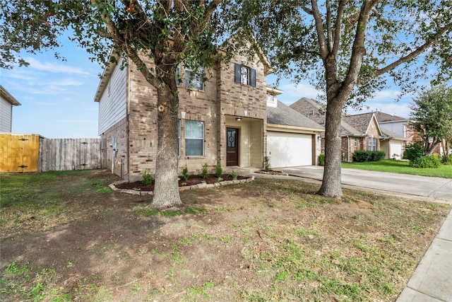 view of front of property with a garage