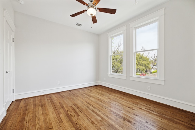 unfurnished room featuring wood-type flooring and ceiling fan