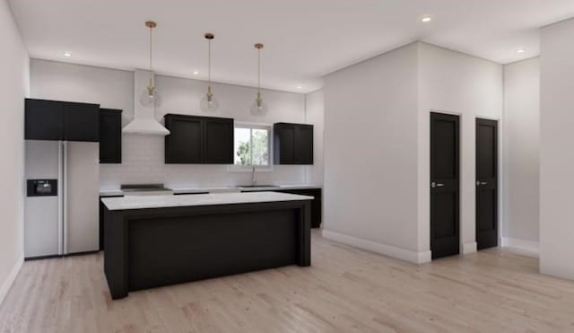 kitchen with backsplash, white refrigerator with ice dispenser, pendant lighting, light hardwood / wood-style flooring, and a kitchen island