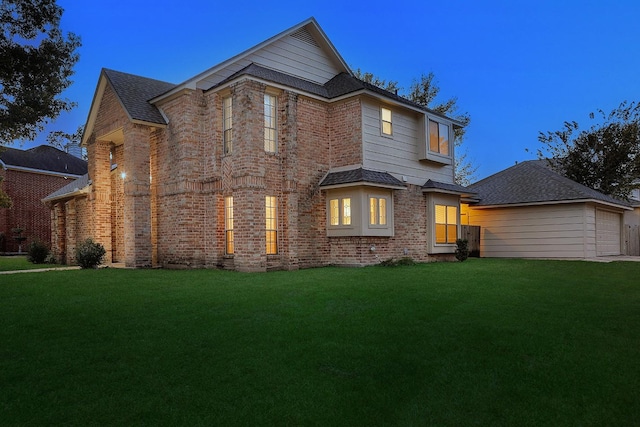 view of front facade with a lawn