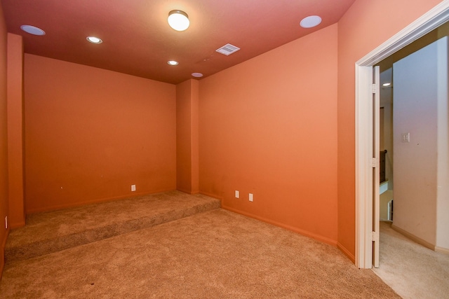 spare room featuring carpet flooring