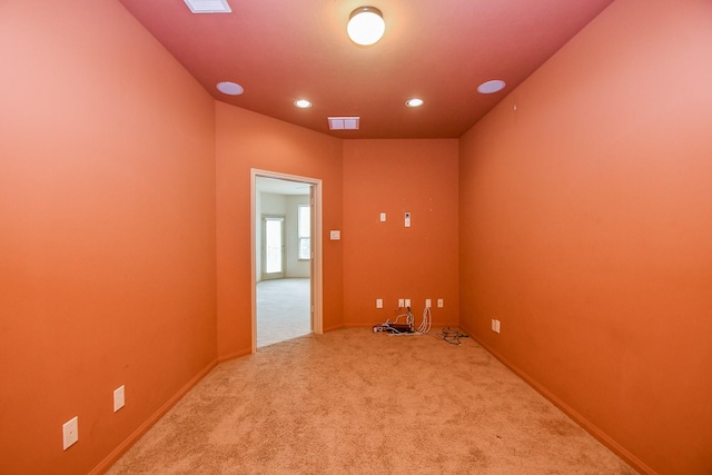 empty room featuring carpet floors