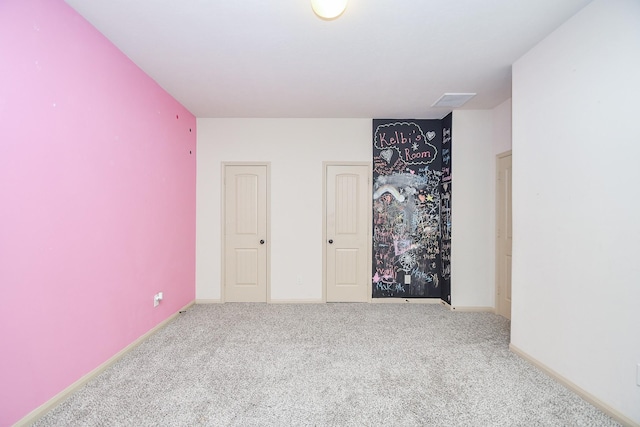 unfurnished bedroom featuring carpet flooring