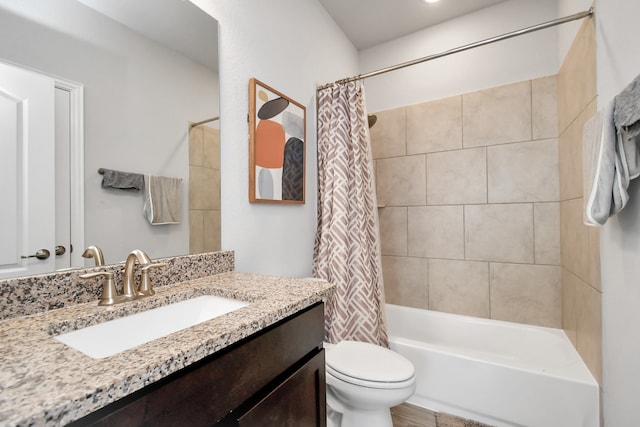 full bathroom featuring vanity, toilet, and shower / tub combo with curtain