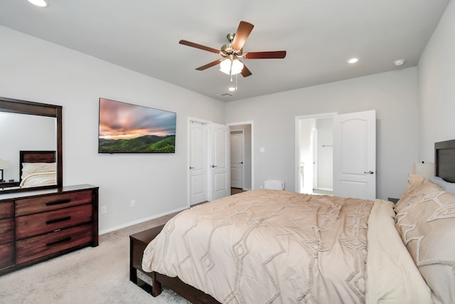 carpeted bedroom featuring ceiling fan