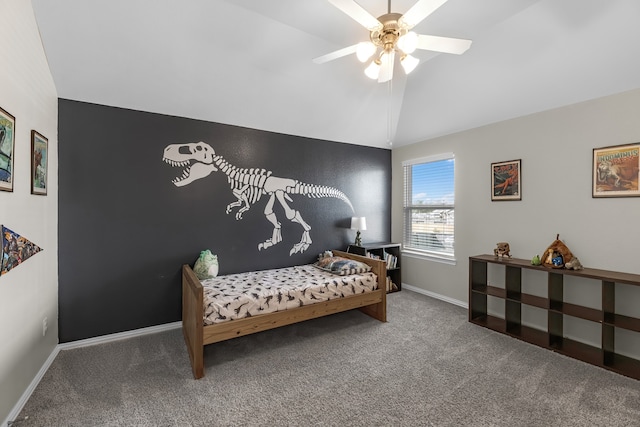 carpeted bedroom featuring ceiling fan and vaulted ceiling