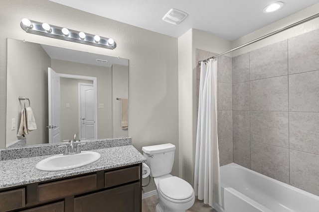 full bathroom with vanity, toilet, and shower / tub combo with curtain